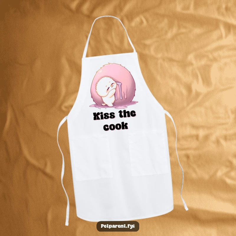 Funny apron showing a small fluffy creature hugging a large, drool-covered object, a humorous take on messy kitchen fun.