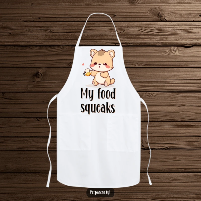 Funny playful animal apron showing a creature tossing a tiny squeaky toy. Humorous kitchen gift.