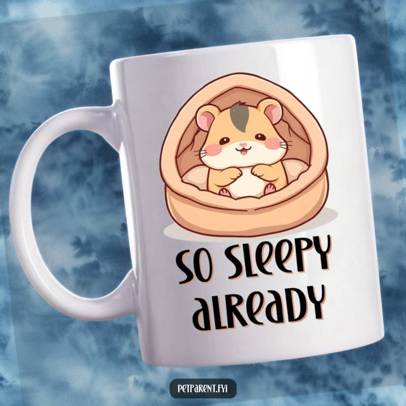 Funny hamster mug showing a cute hamster character happily building a soft, cozy bed, symbolizing comfort and domestic bliss.