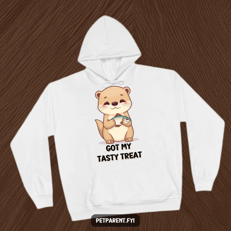 Funny and happy scene of an otter character holding a small fish, featured on a soft, hooded sweatshirt.