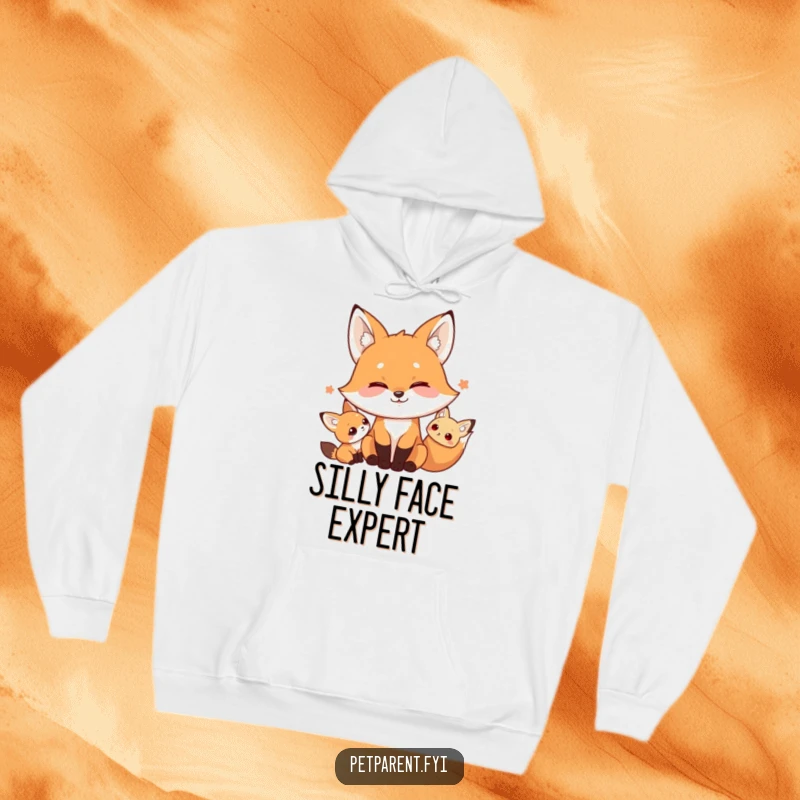 Funny hoodie showcasing a playful fox with a funny, exaggerated silly face, looking mischievously at a tiny companion, perfect for cozy humor.