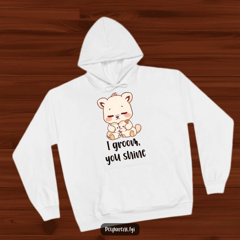 Funny nurturing animal character gently grooming a smaller animal, printed on a soft, warm hoodie.