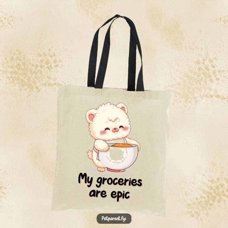 Funny tote bag with a fluffy creature in a tiny apron fumbling with a giant food bowl, symbolizing comic kitchen struggles.